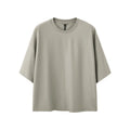Men's loose fitting short sleeve pullover shirt in sand grey or black cotton-polyester blend fabric