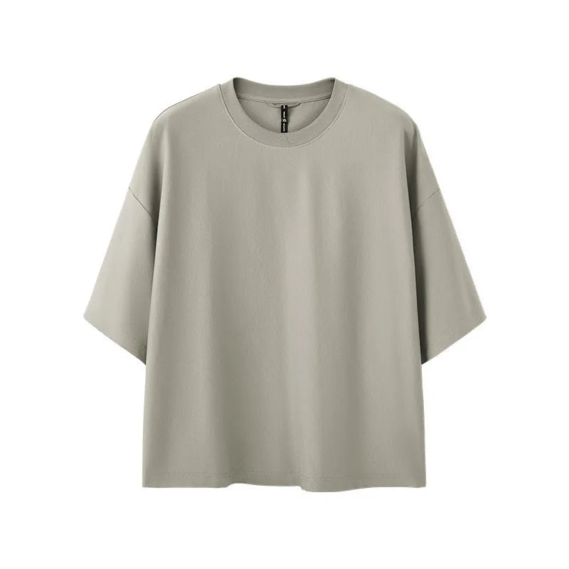 Men's loose fitting short sleeve pullover shirt in sand grey or black cotton-polyester blend fabric