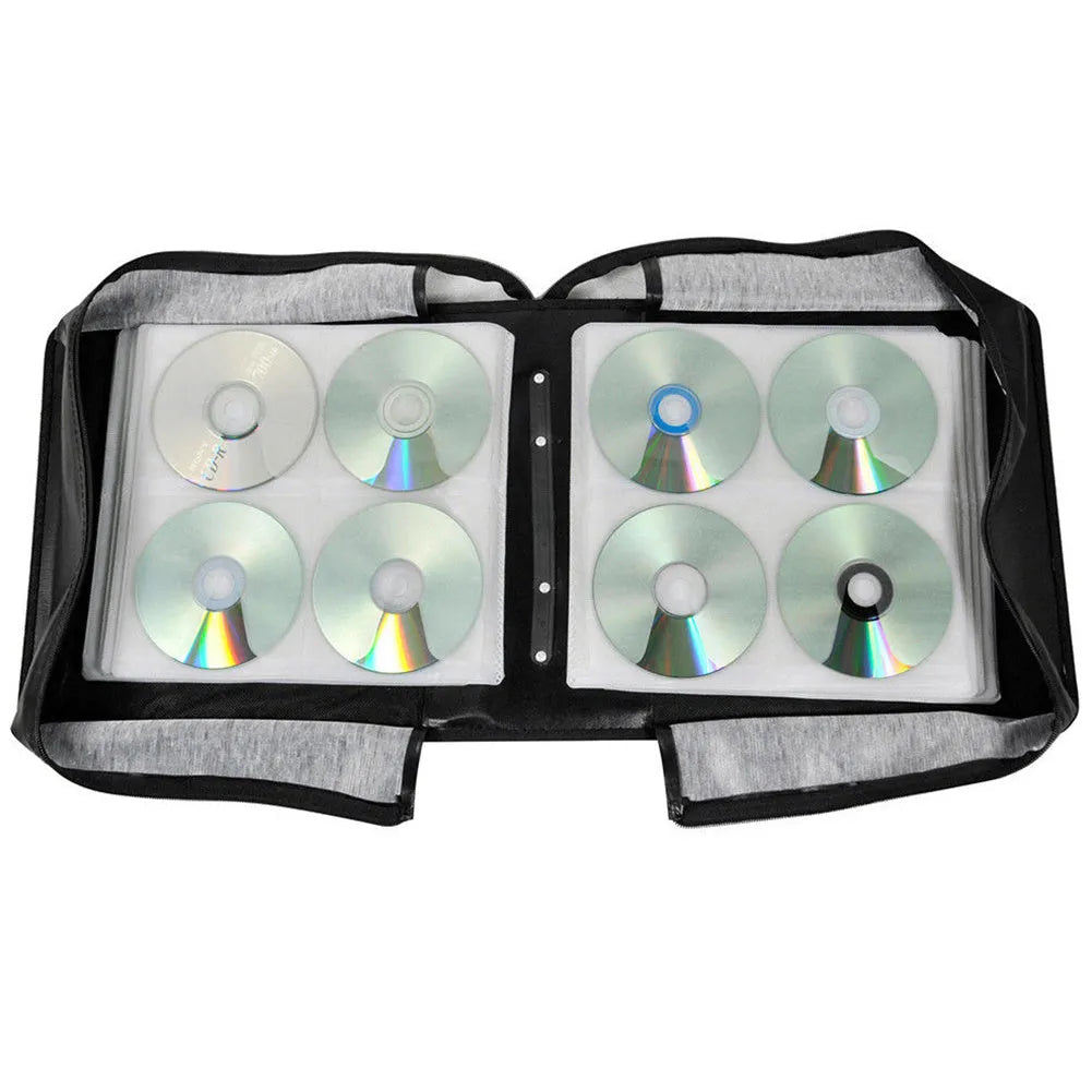 Black Oxford fabric CD DVD storage organiser binder with a top hand strap and zipper closure.