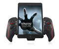 Wireless telescopic gamepad controller PG-9023 in black ABS plastic extended to hold a smartphone