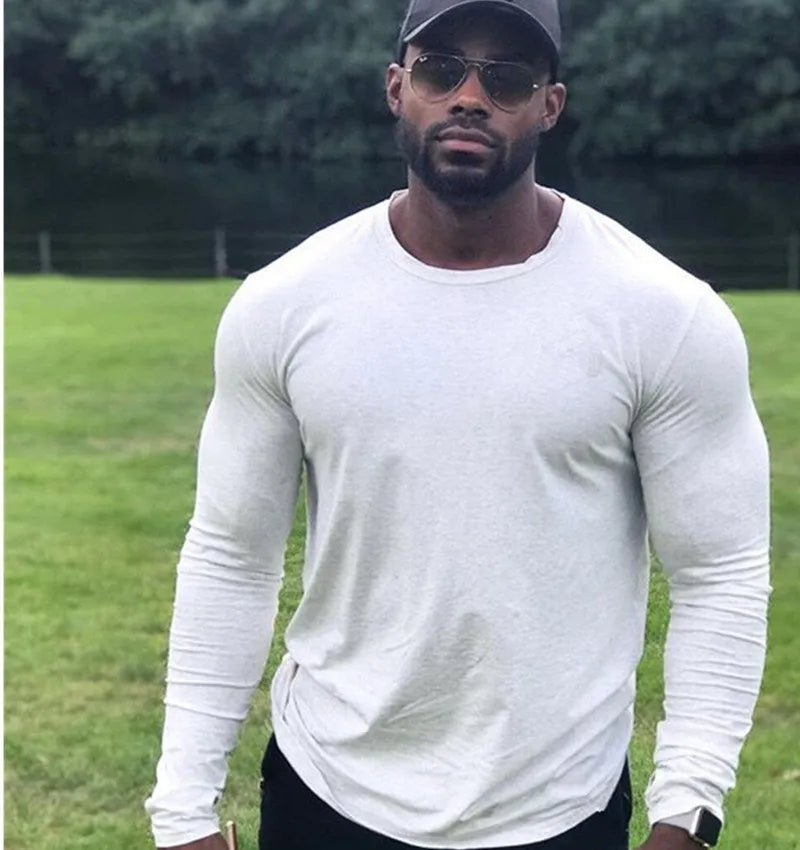 Men's long-sleeved modal T-shirt in white, slim fit, plain round neck, on white background