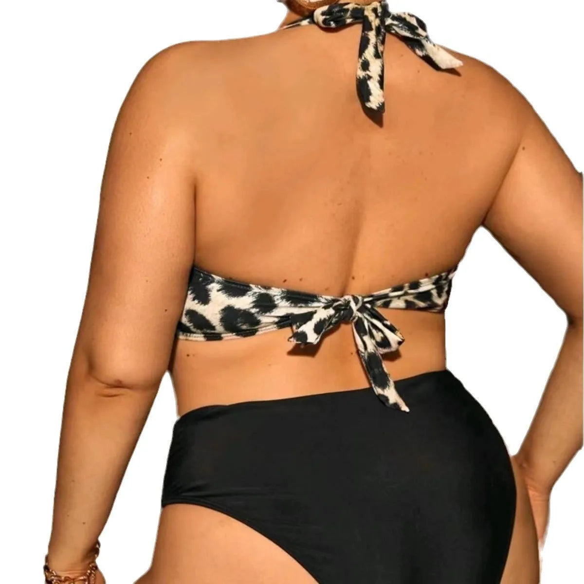 Plus size high waist leopard print bikini set with split top and shorts, showing the nylon and spandex fabric