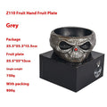 Plastic Halloween candy bowl with motion-activated skeleton hand and lighted red eyes, grey khaki or pumpkin colour