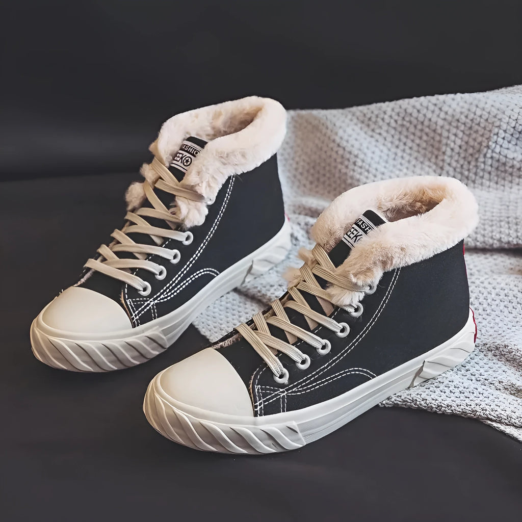 Women's black canvas high top trainers with animal print, cotton lining, buckle fastening and flat rubber sole, sizes 35-40
