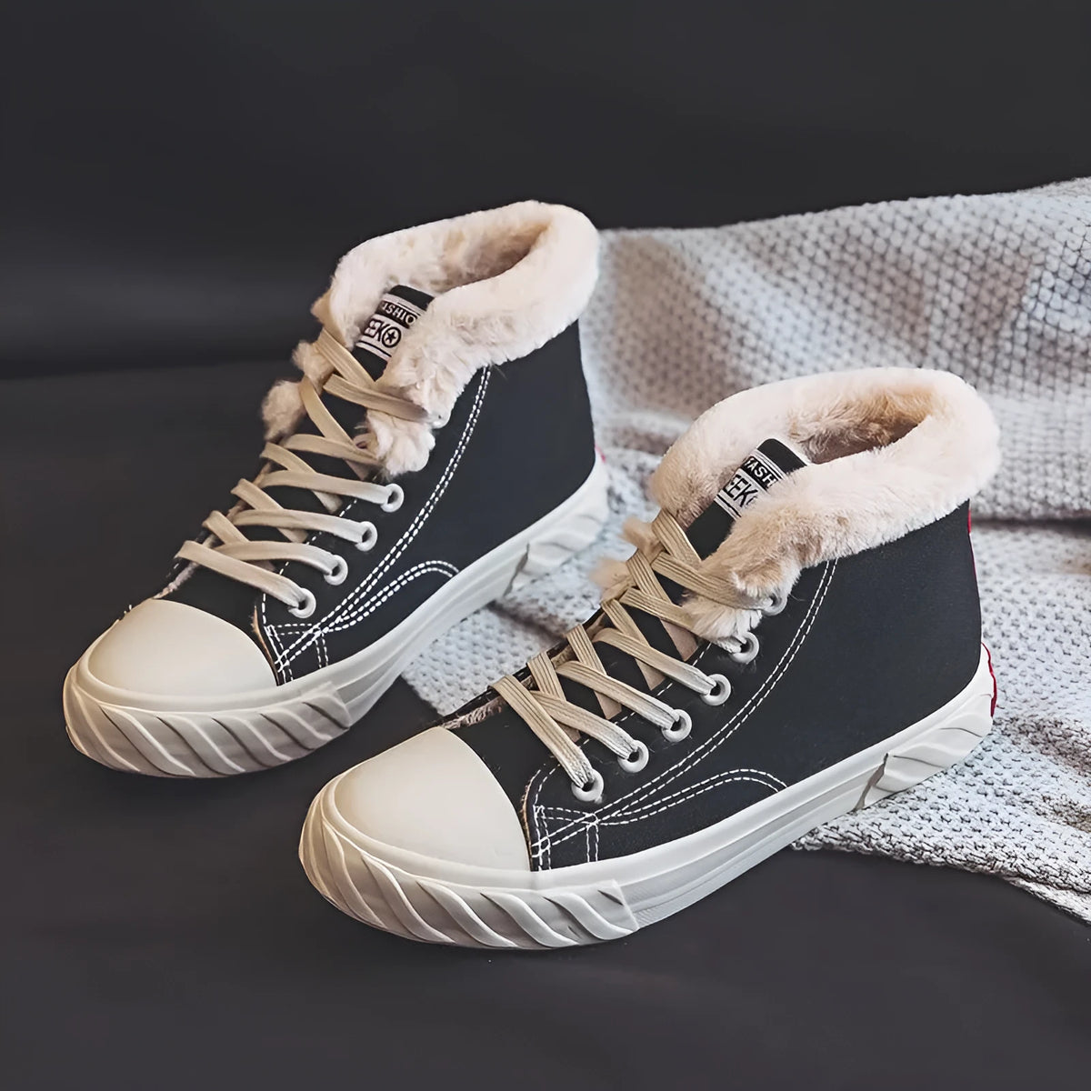 Women's black canvas high top trainers with animal print, cotton lining, buckle fastening and flat rubber sole, sizes 35-40