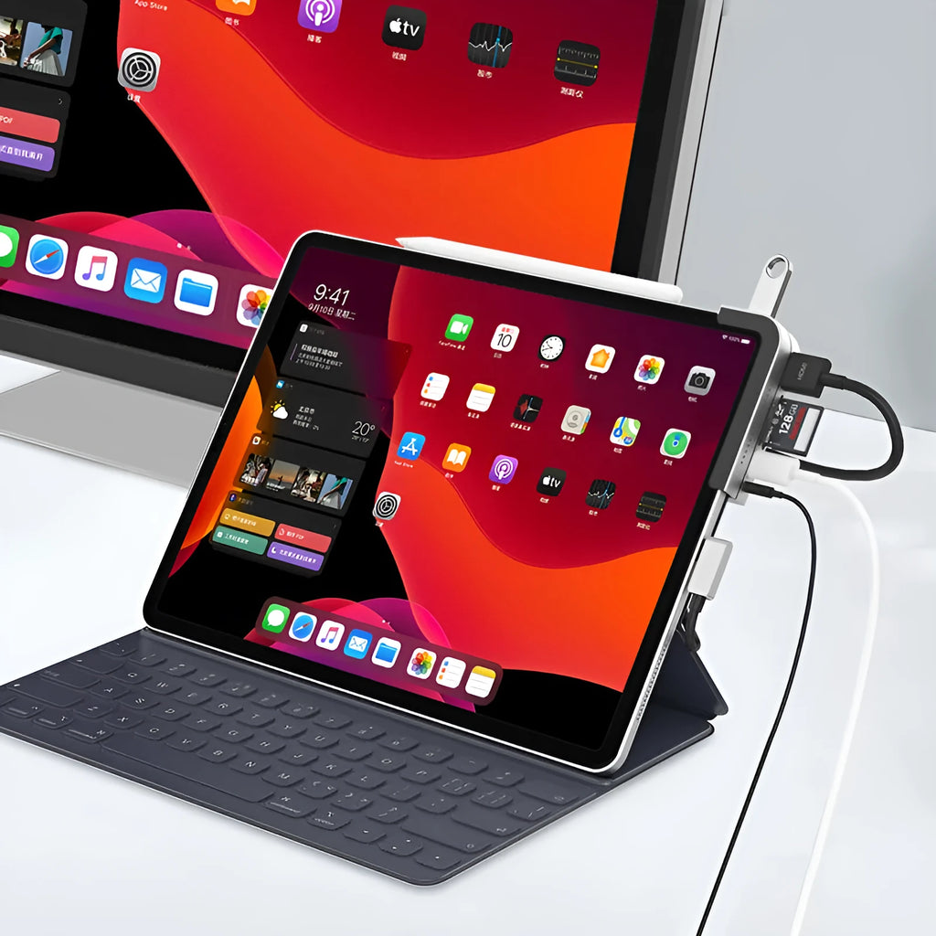 Silver aluminium grey USB-C 6-in-1 docking station for iPad Pro, showing HDMI port and card reader slots.