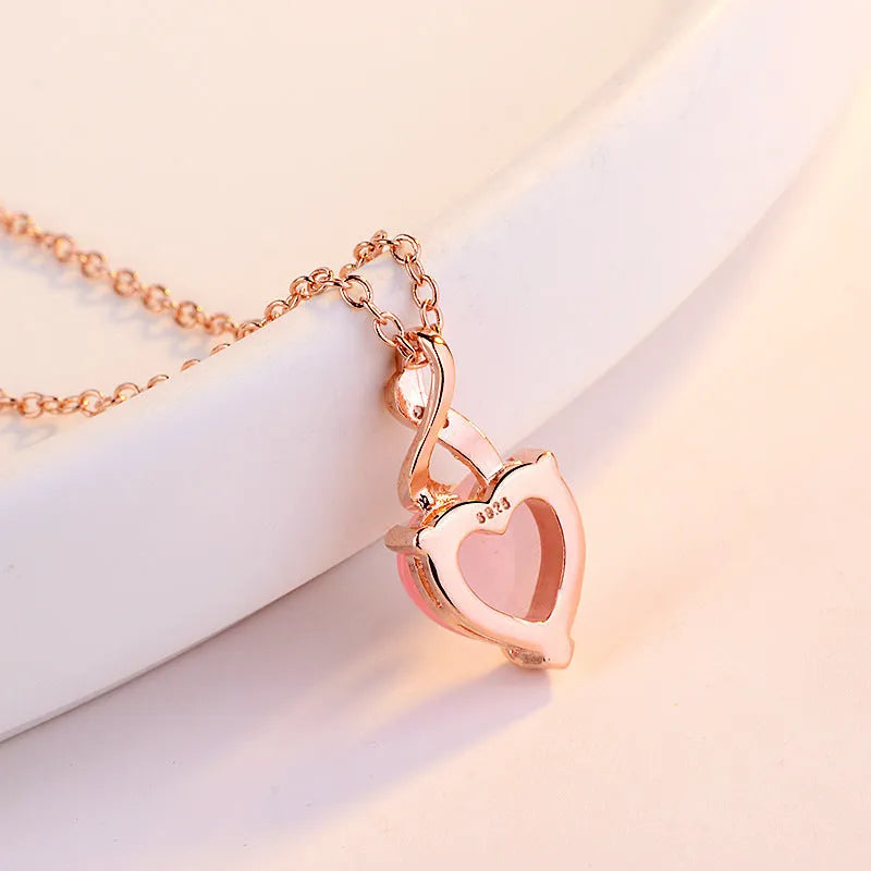 Women's pink heart crystal necklace with rose gold cross chain pendant