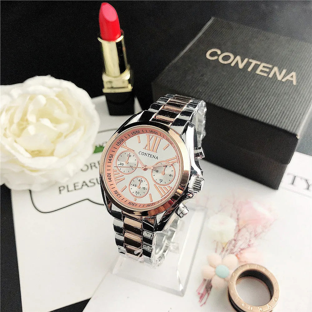 Women's silver and rose gold mesh strap watch with diamond quartz movement and pointer display