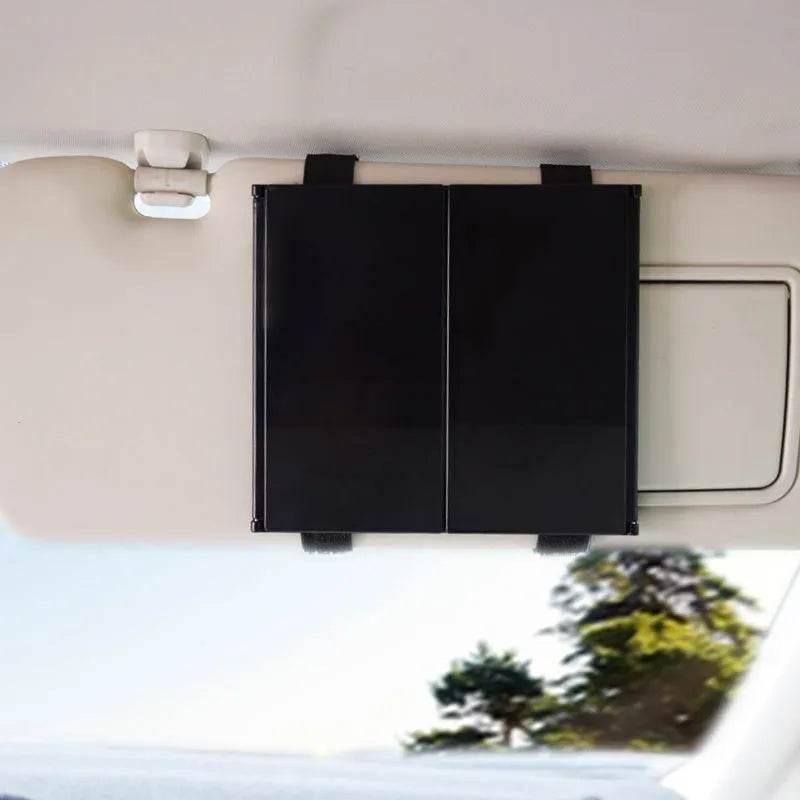 Silver car folding makeup mirror shown closed at 15.5cm and open at 30.5cm wide.