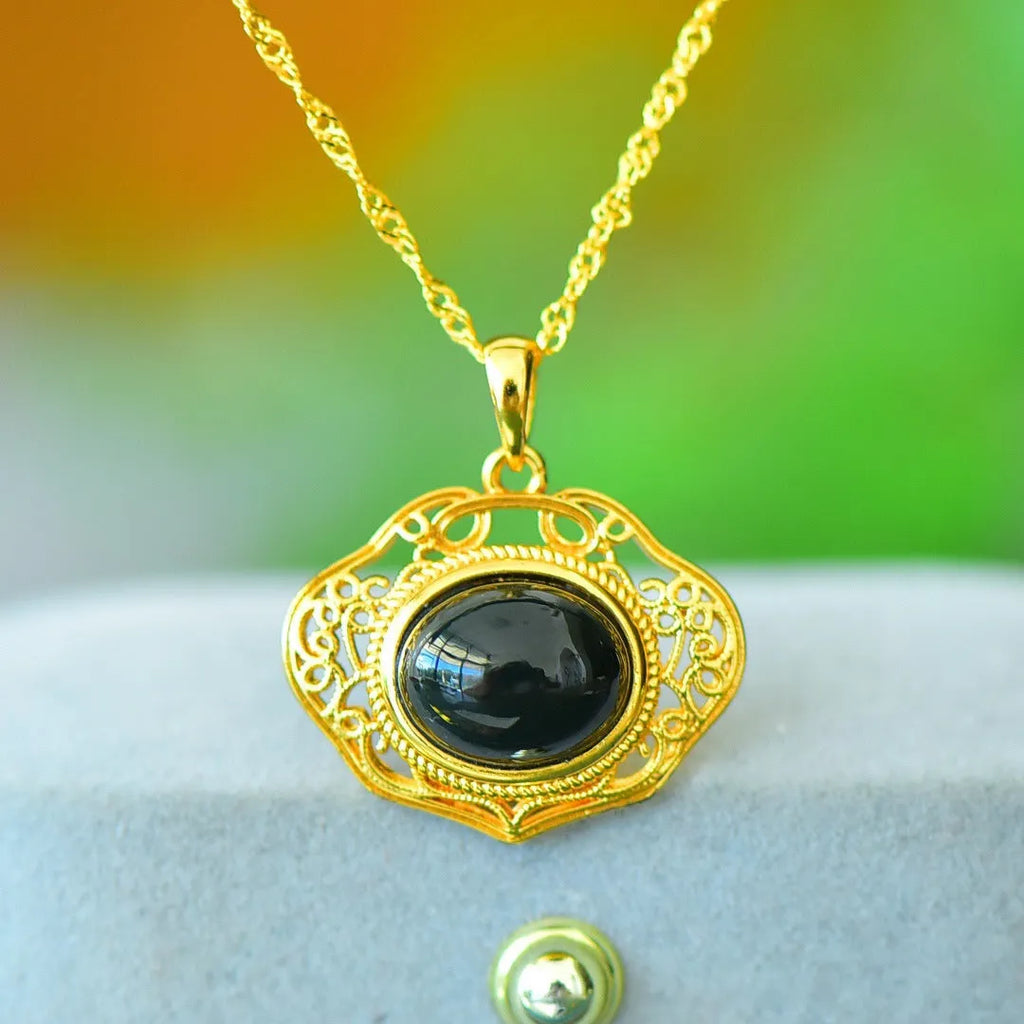Flat natural Hetian grey jade pendant with copper inlay and ink blue jade accents on a necklace chain.