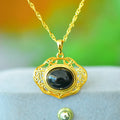 Flat natural Hetian grey jade pendant with copper inlay and ink blue jade accents on a necklace chain.