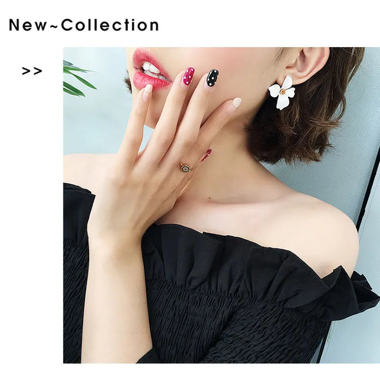 Floral stud earrings for women in white and pink colours with electroplated alloy material