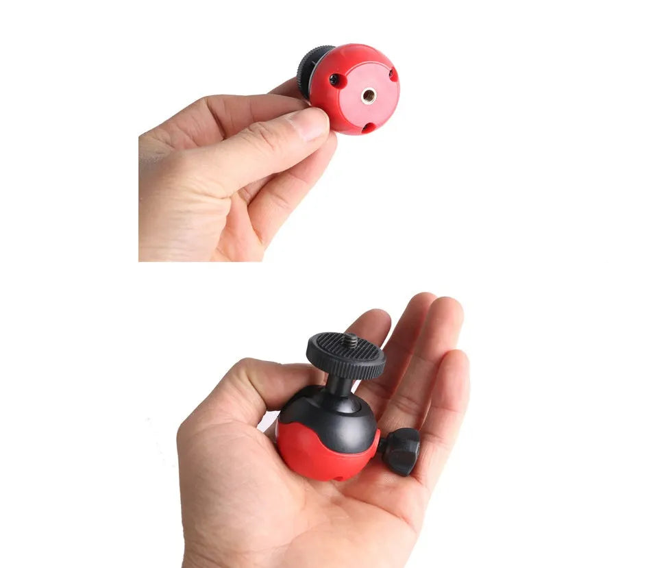 Black octopus tripod with flexible rubber legs and spherical gimbal for cameras and phones