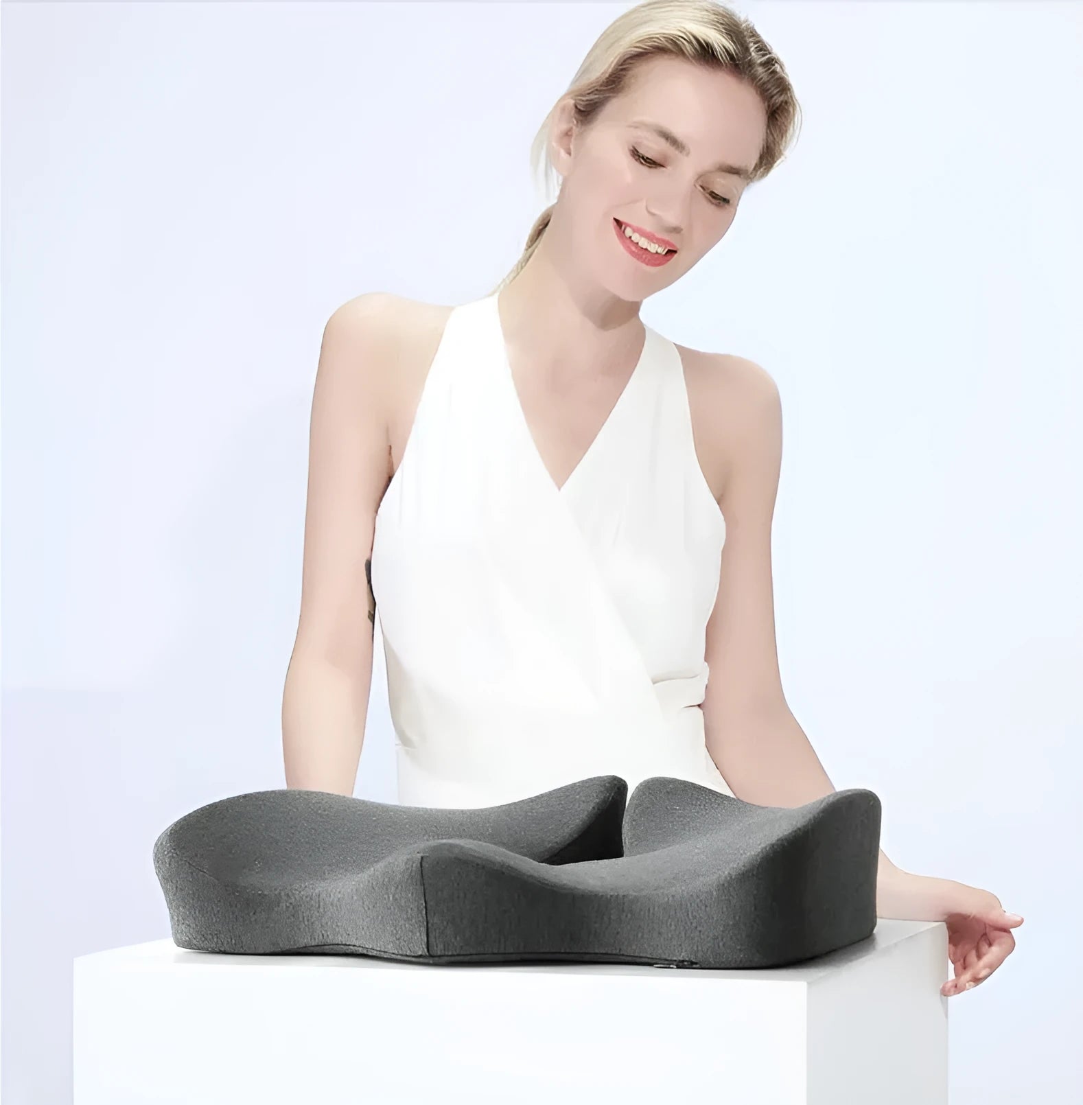Cotton memory foam seat cushion in light gray on a wooden chair, measuring 46x32cm