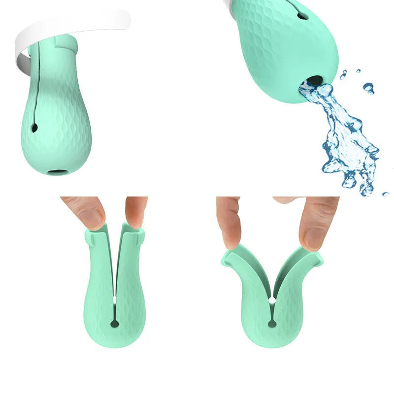 Green silicone cat anti-scratch foot covers with adjustable straps for pet handling