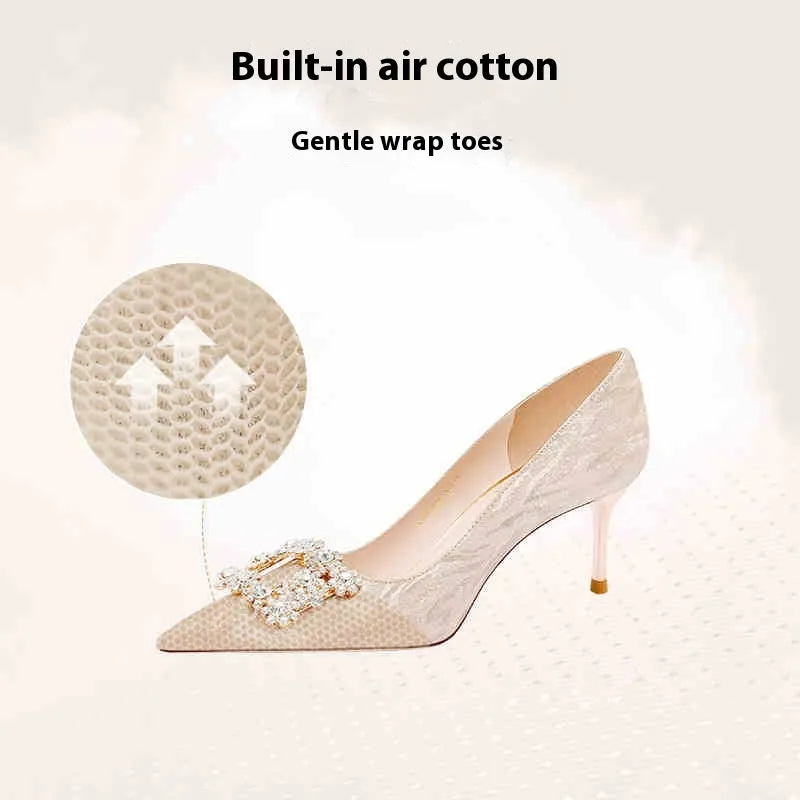 Champagne gold women's high heel pumps with pointed toe, stiletto heel, and rhinestone decoration.