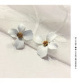 Floral stud earrings for women in white and pink colours with electroplated alloy material