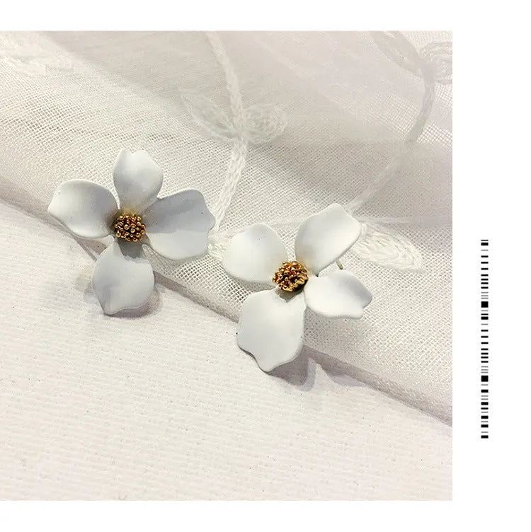 Floral stud earrings for women in white and pink colours with electroplated alloy material