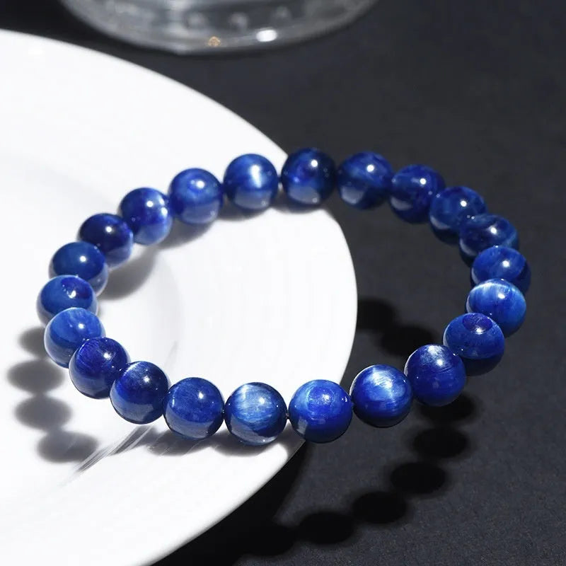 Blue crystal bracelet with geometric Ruyi design showing polished beads in various diameter options