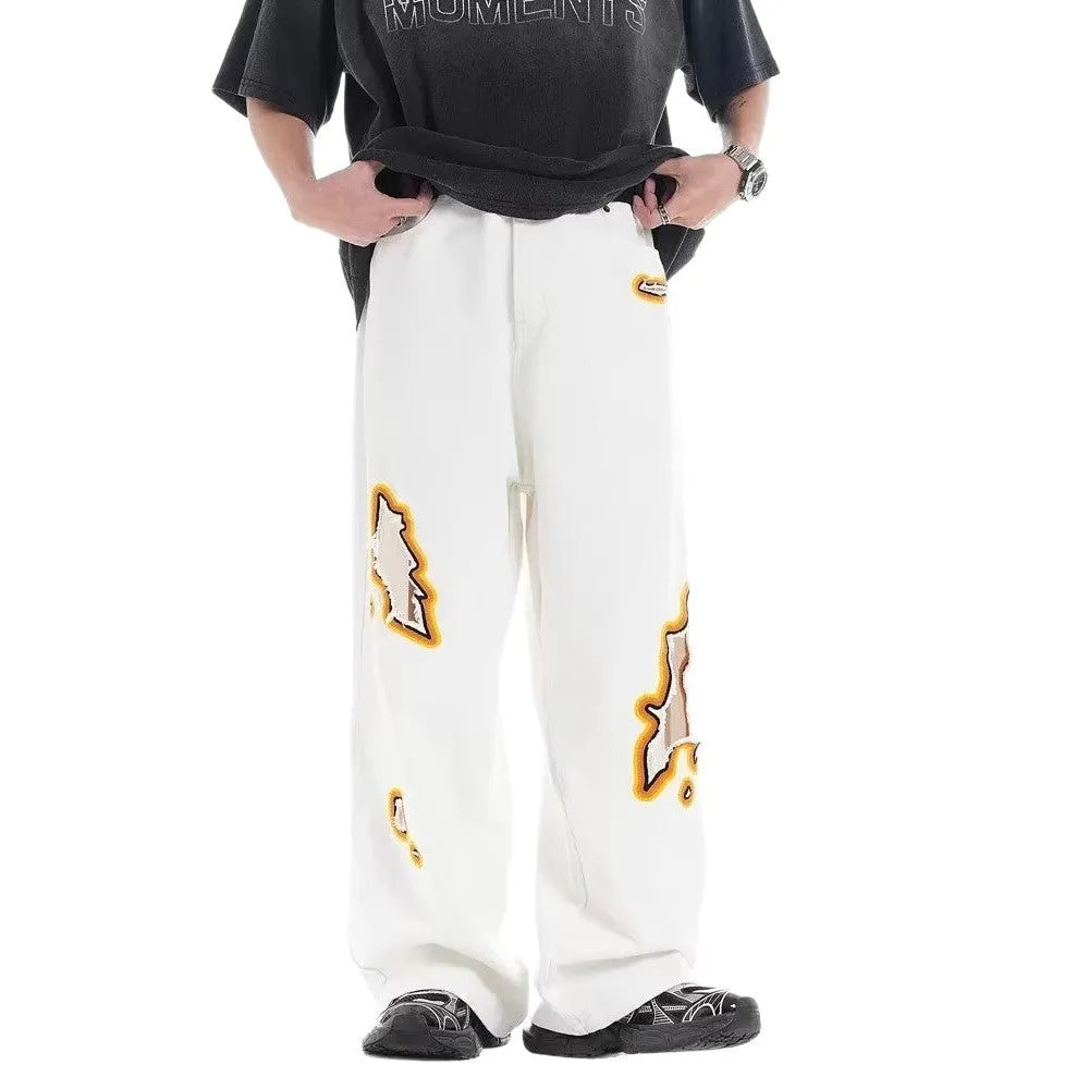 Retro washed ripped embroidery loose straight-leg trousers in white with zipper fly
