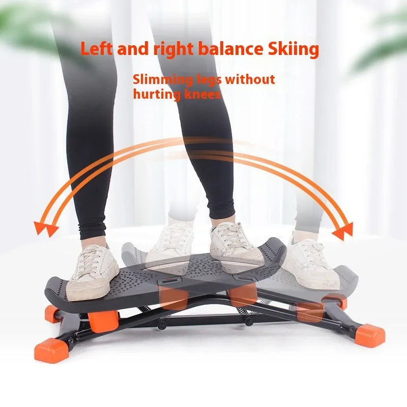 Black JS101A mini indoor fitness skiing machine with elastic hand straps.