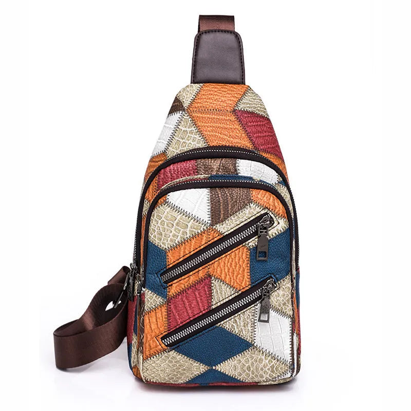 Color block PU leather crossbody bag with three-dimensional outer pocket and visible stitching detail