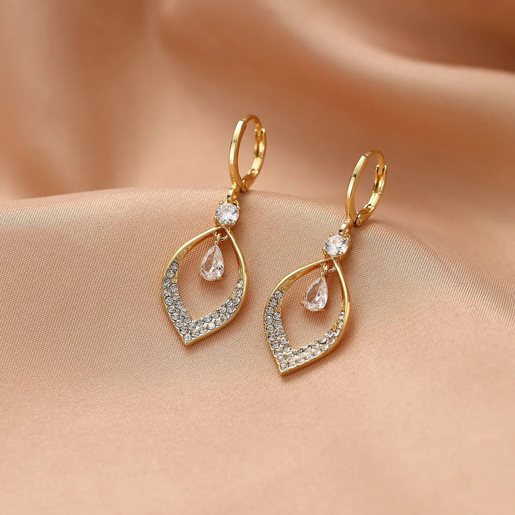 Women's copper zircon water drop earrings with tassels and a choice of gold or silver buckles.