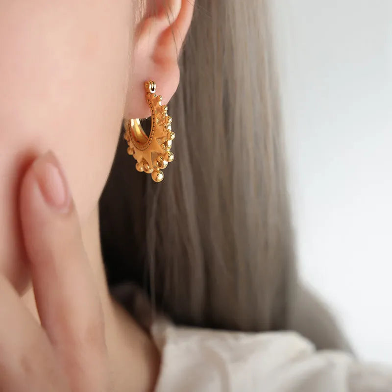 Titanium steel ball-shaped safety lock earrings in gold or steel with U-shaped electroplated finish