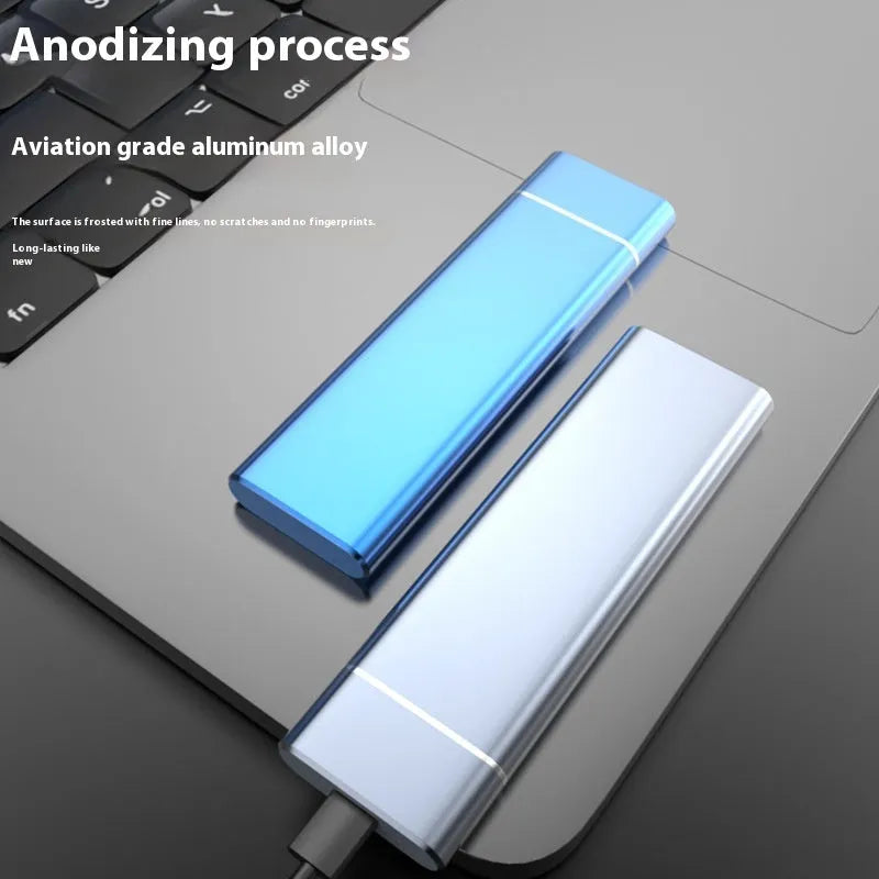 Sapphire blue portable solid state hard drive with metal housing, USB cable and manual