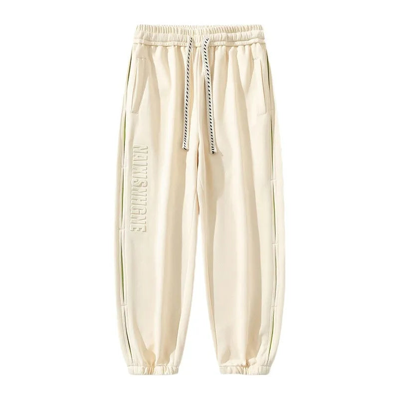Men's cotton banded ankle pants with collage stitching detail in loose fit design