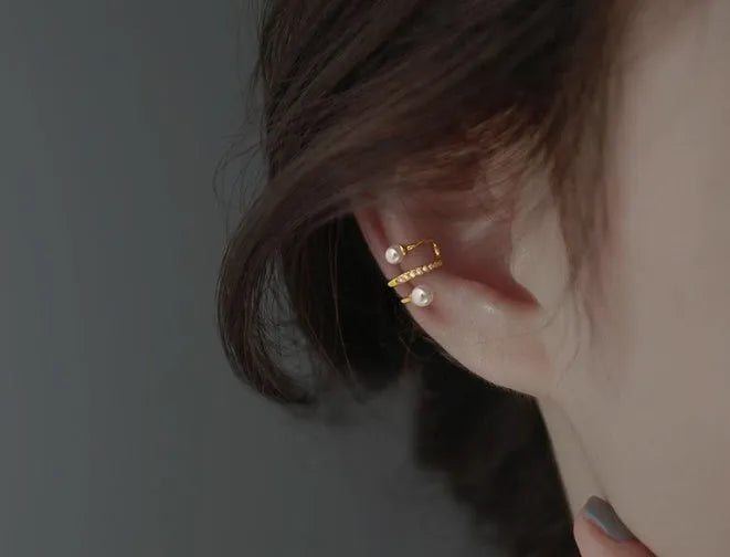 Silver plated pearl ear clips for unpierced ears, shown as a gold or silver pair in Japanese Korean style.