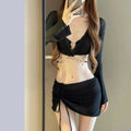 Women's long sleeve split bikini swimsuit in black polyester for swimming and wading