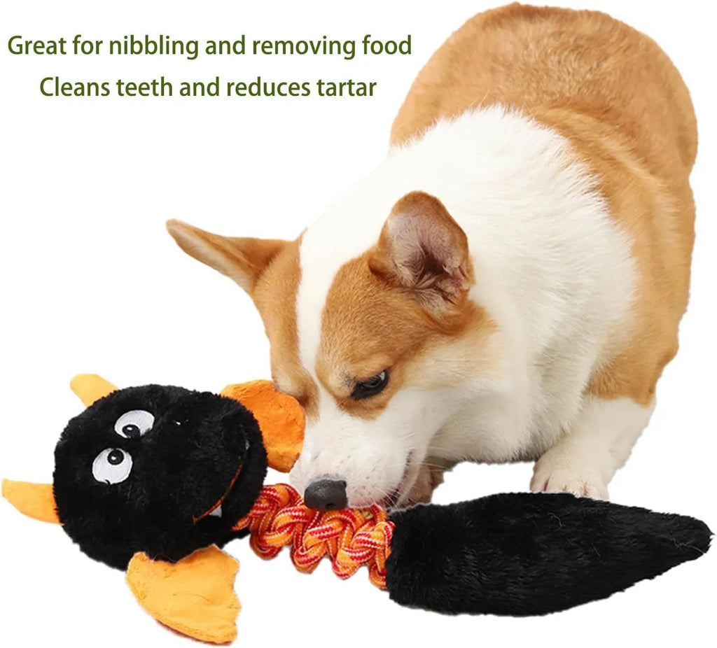 Large black plush dog toy with a rope knot, showing cartoon shape and soft texture.