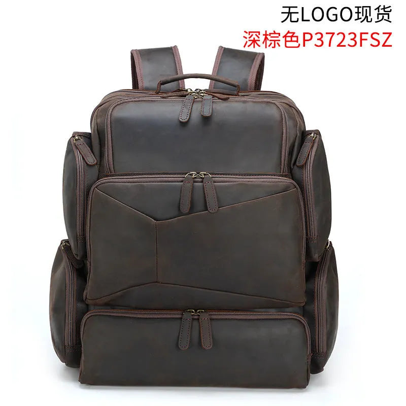 Dark brown retro genuine leather backpack for men showing front view with double straps and soft handle.