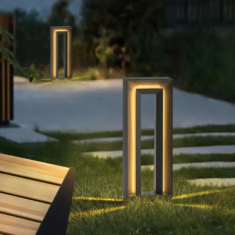 Square stainless steel and acrylic solar courtyard garden lamp with geometric design for outdoor landscape lighting.
