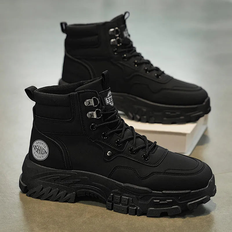 Men's black and yellow high-top Martin boots with a mid heel on an injection moulded sole.