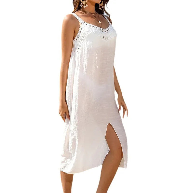 Women's white crochet beach dress with bottom slit for swimming and beachwear