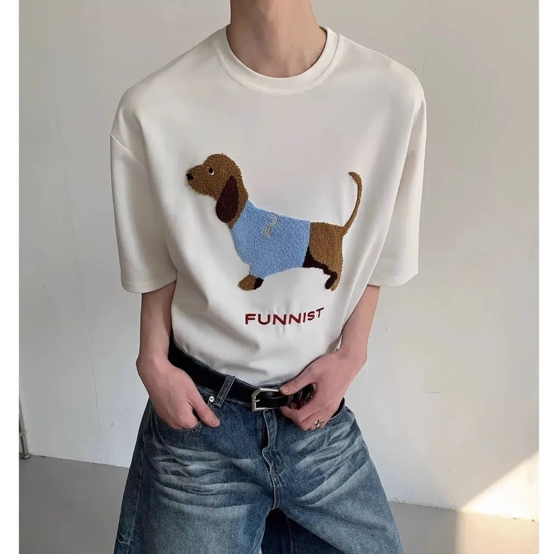Men's grey cotton T-shirt with embroidered sausage dog design on the chest, short sleeves and round neck.