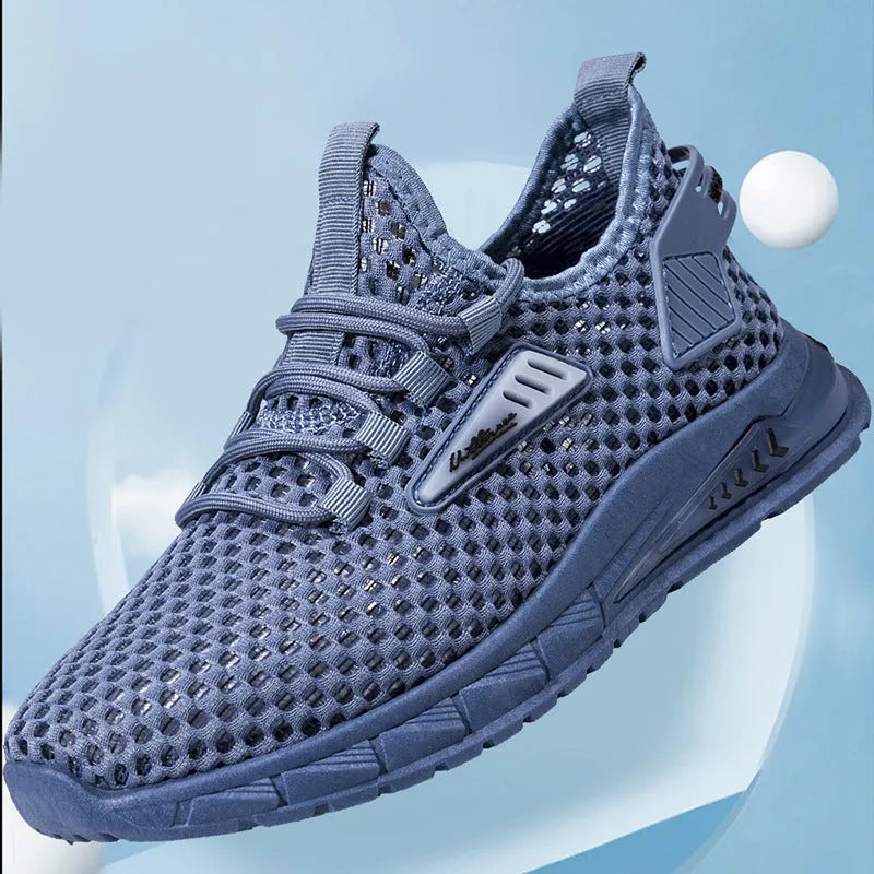 Men's beige casual sneakers with synthetic leather upper and mesh detailing, showing lace-up front and low-profile EVA sole.
