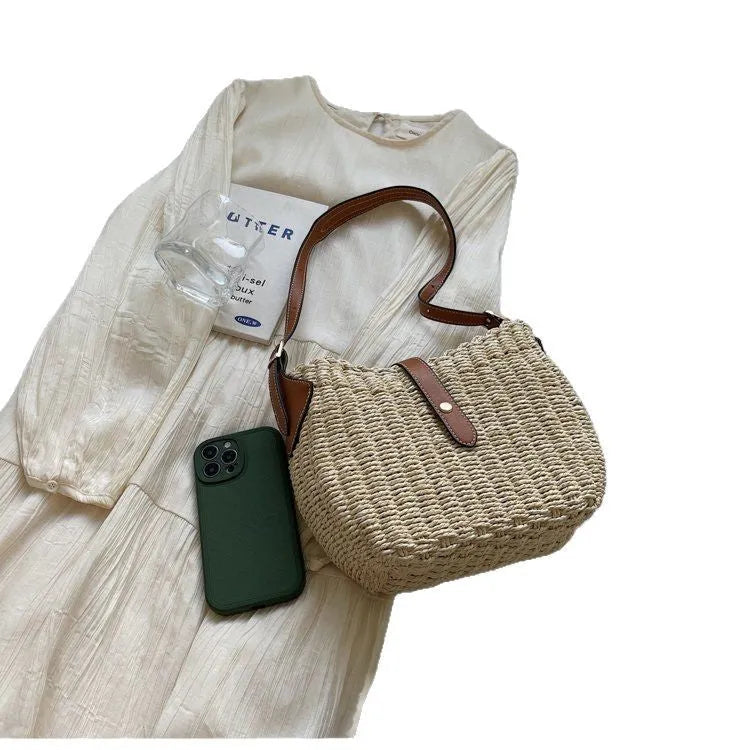 Fashion casual oval straw crossbody bag in creamy white with contrast weave and polyester lining