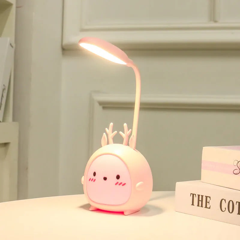 Cartoon deer USB charging folding LED reading lamp with plastic shade on desk