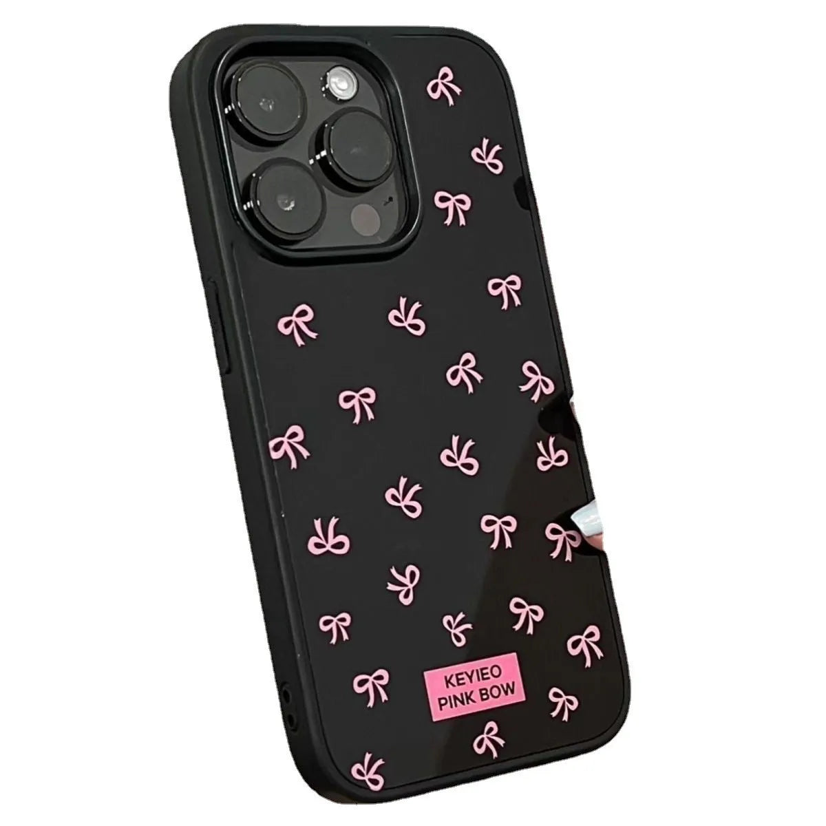 Black silicone iPhone case with sweet bow design placed on a white surface, all-inclusive back and side coverage