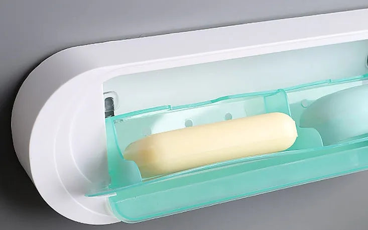 Green large ABS plastic drain soap box with lid on a bathroom counter