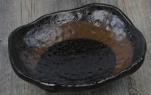 Creative Japanese style coarse pottery bowl with irregular shape and floral decorations