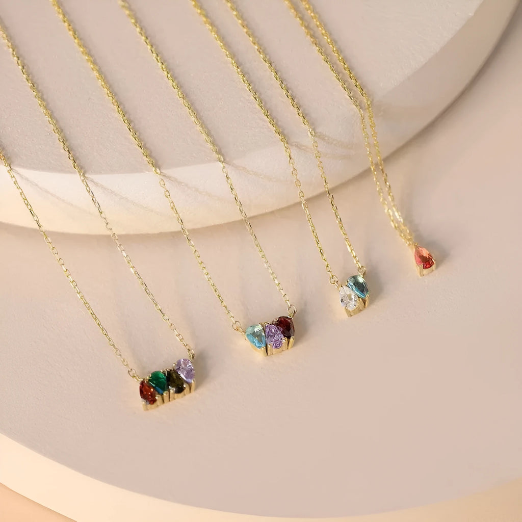 Titanium steel necklace with a zircon birth month pendant in silver, gold, or rose gold colour.