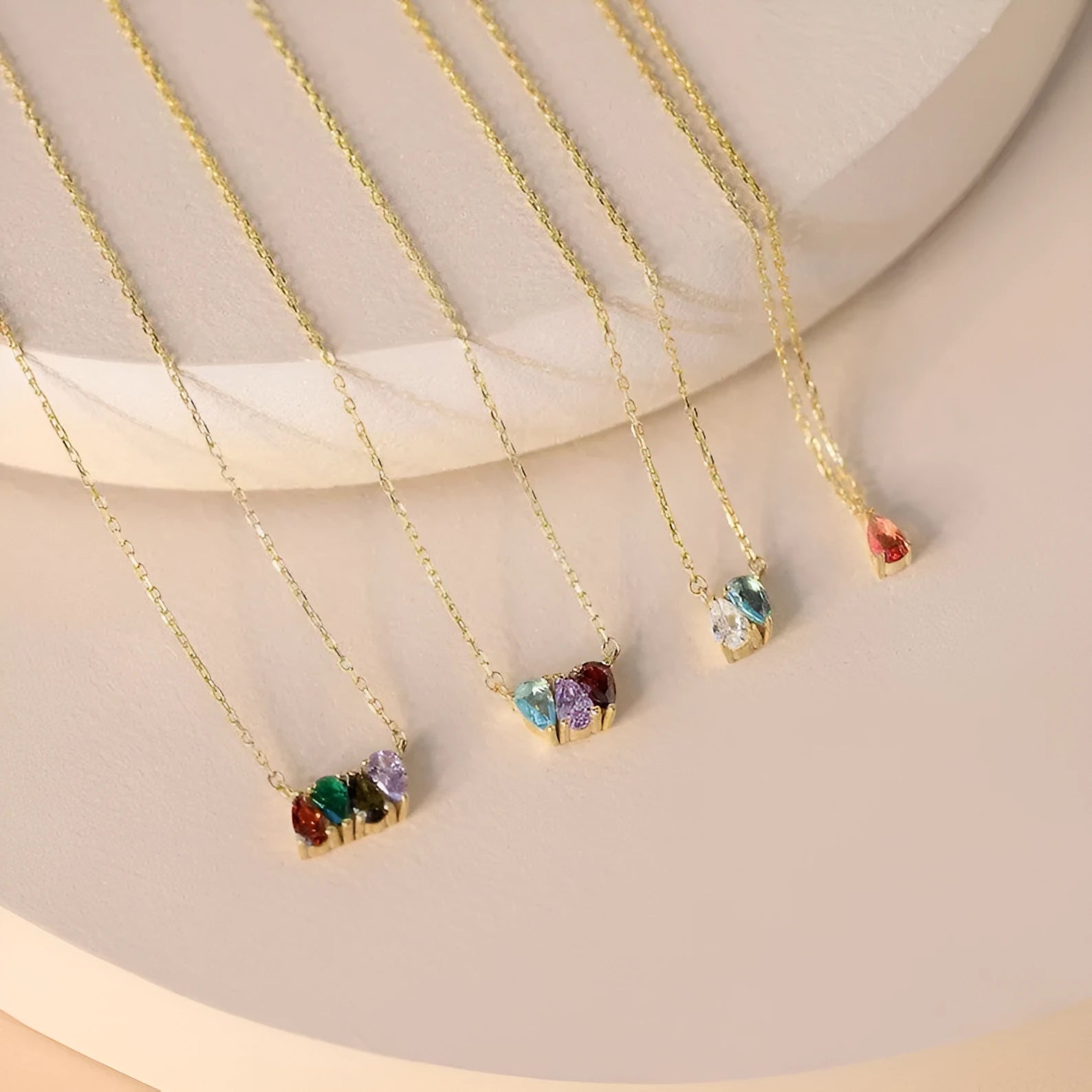 Titanium steel necklace with a zircon birth month pendant in silver, gold, or rose gold colour.