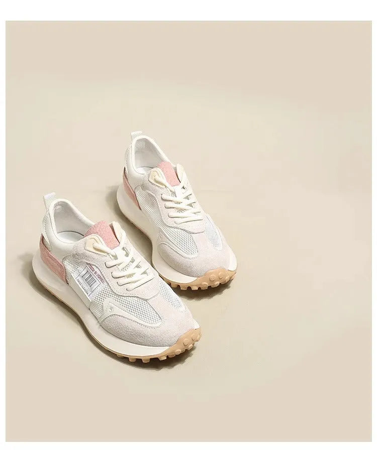 Women's grey and pink low-top retro sneaker with round toe and flat rubber sole