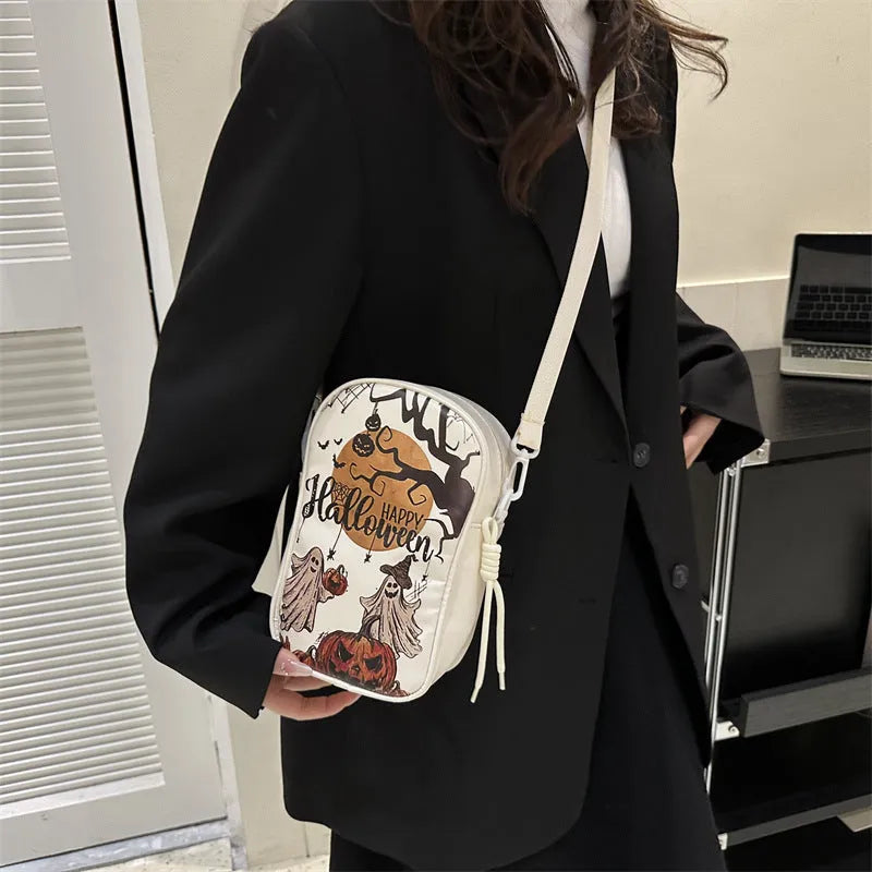 Halloween graffiti crossbody bag with pumpkin ghost bat print in medium 14x23x9.5cm size