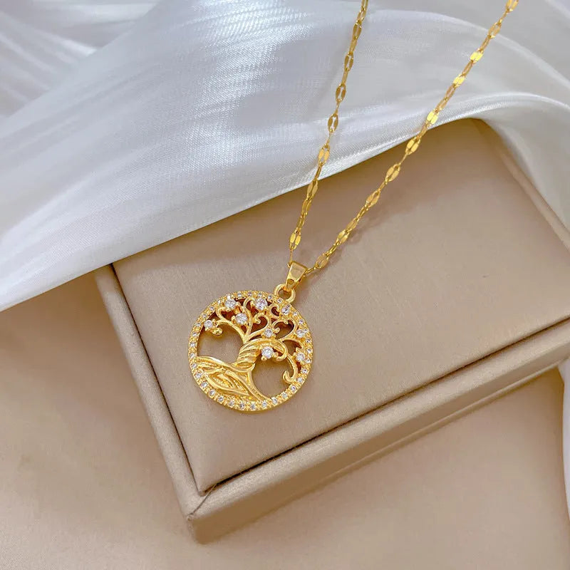Gold-coloured adjustable necklace with a mother of pearl and rhinestone cross pendant on a lip chain.