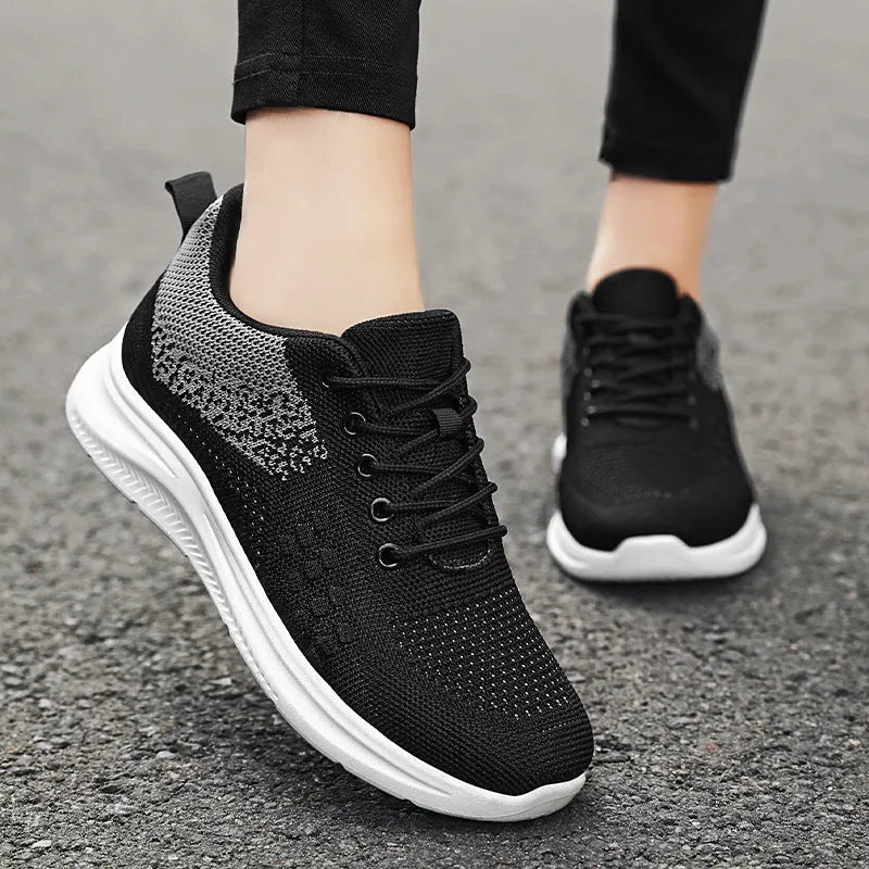 Women's lace-up sneakers in breathable mesh cloth, solid colour, round toe, PVC sole